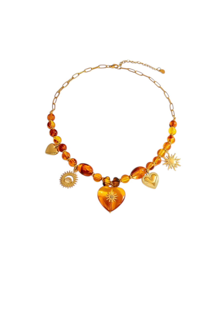 Goudkleurige ketting met bedeltjes