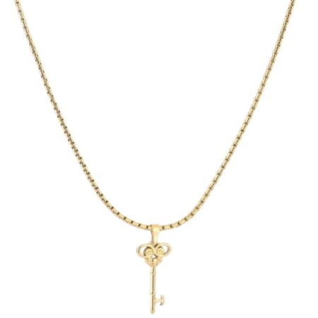 Korte goudkleurige ketting met sleutel