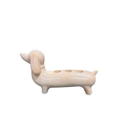Beige teckel kaarsenstandaard